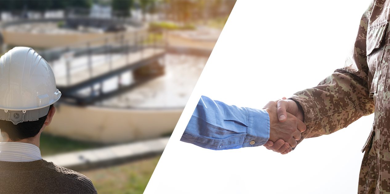 worker and military handshake