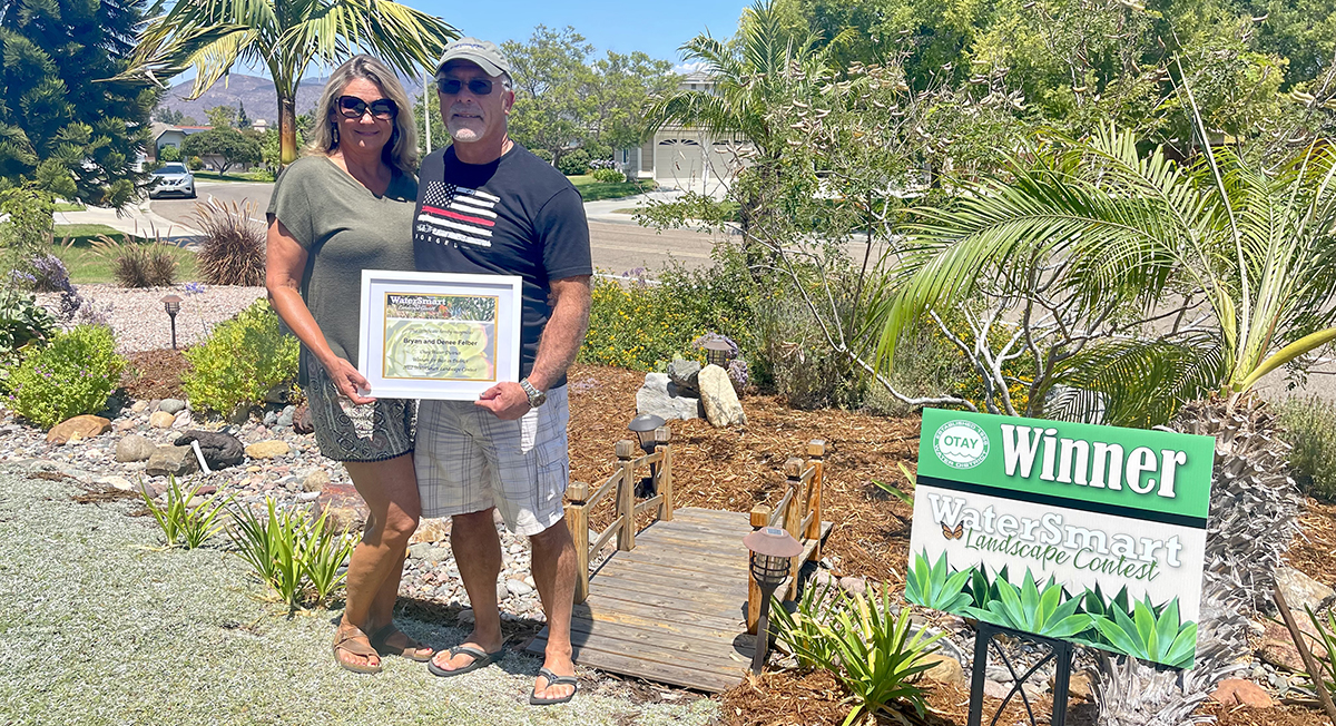 Contest winners in their yard