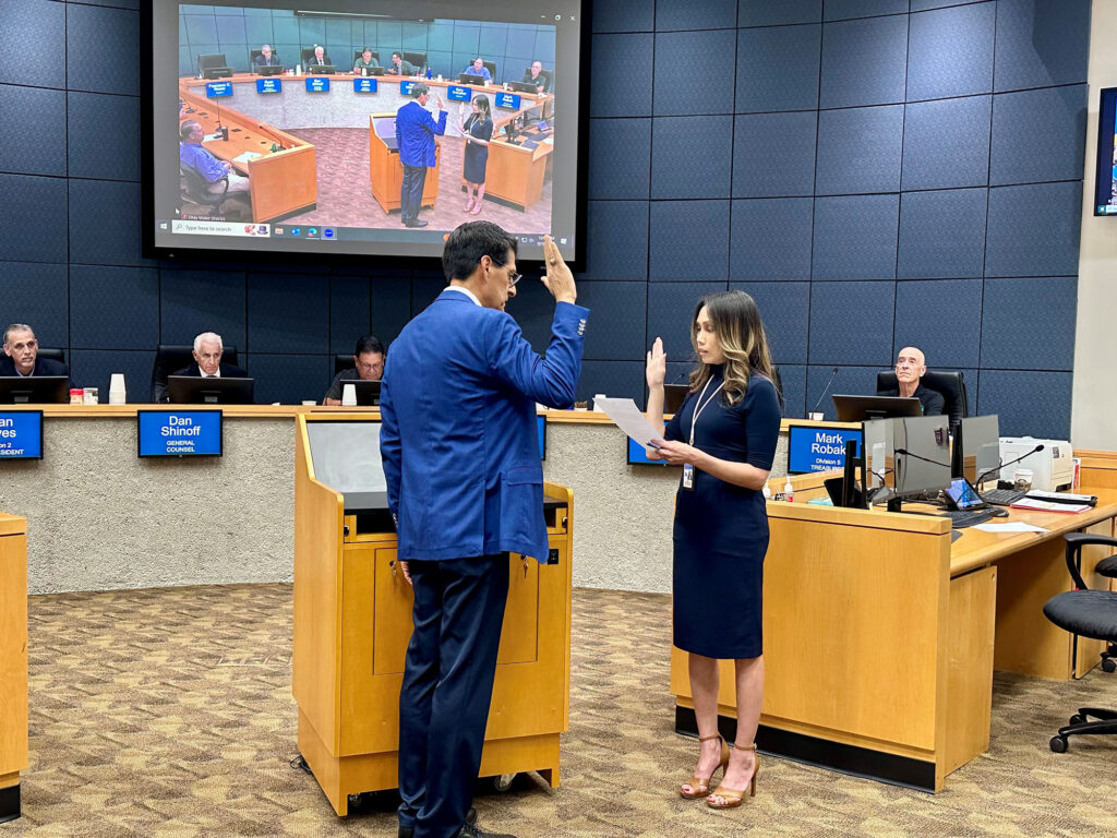 Director Rivera taking the oath of office